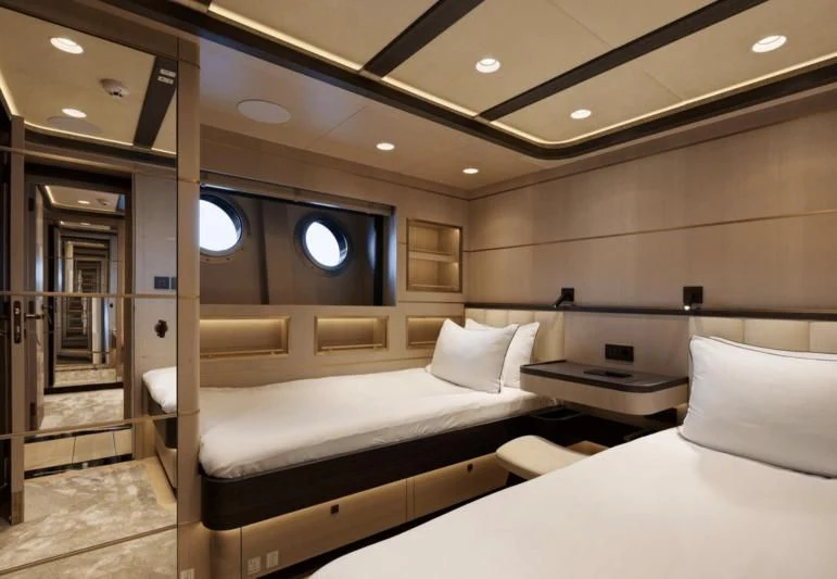 a room with a bed and a mirror aboard SALLYNA Yacht for Sale