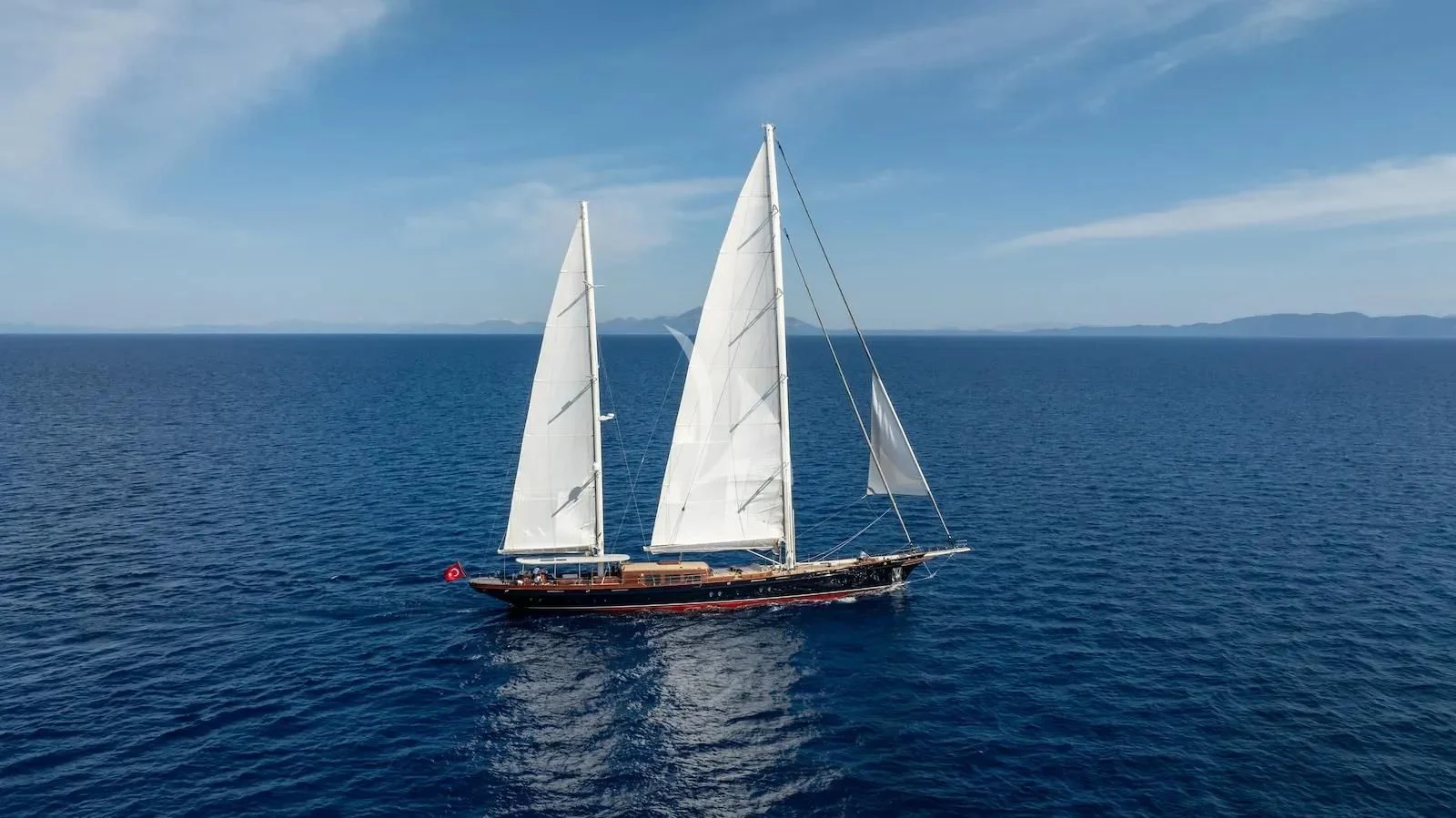 a sailboat on the water aboard SALLYNA Yacht for Sale