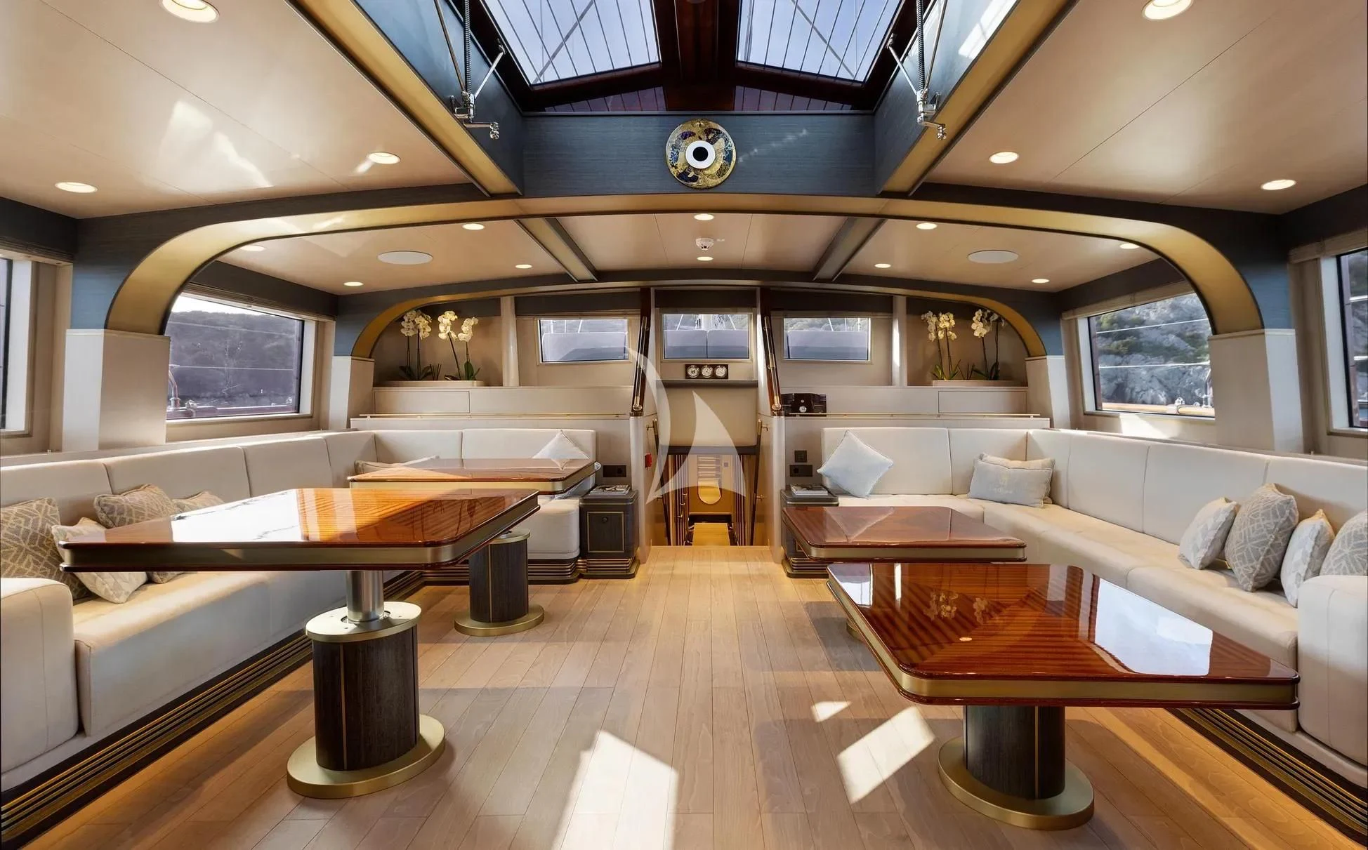 a room with couches and tables aboard SALLYNA Yacht for Sale