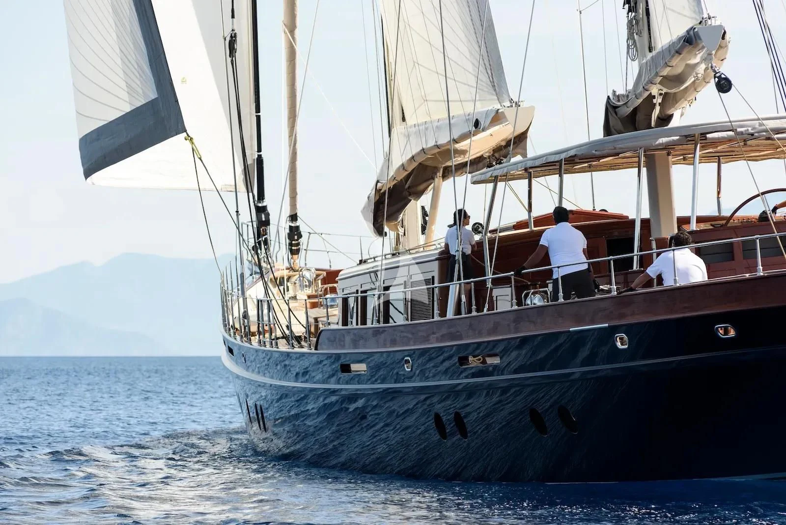 a group of people sailing on a boat aboard SALLYNA Yacht for Sale