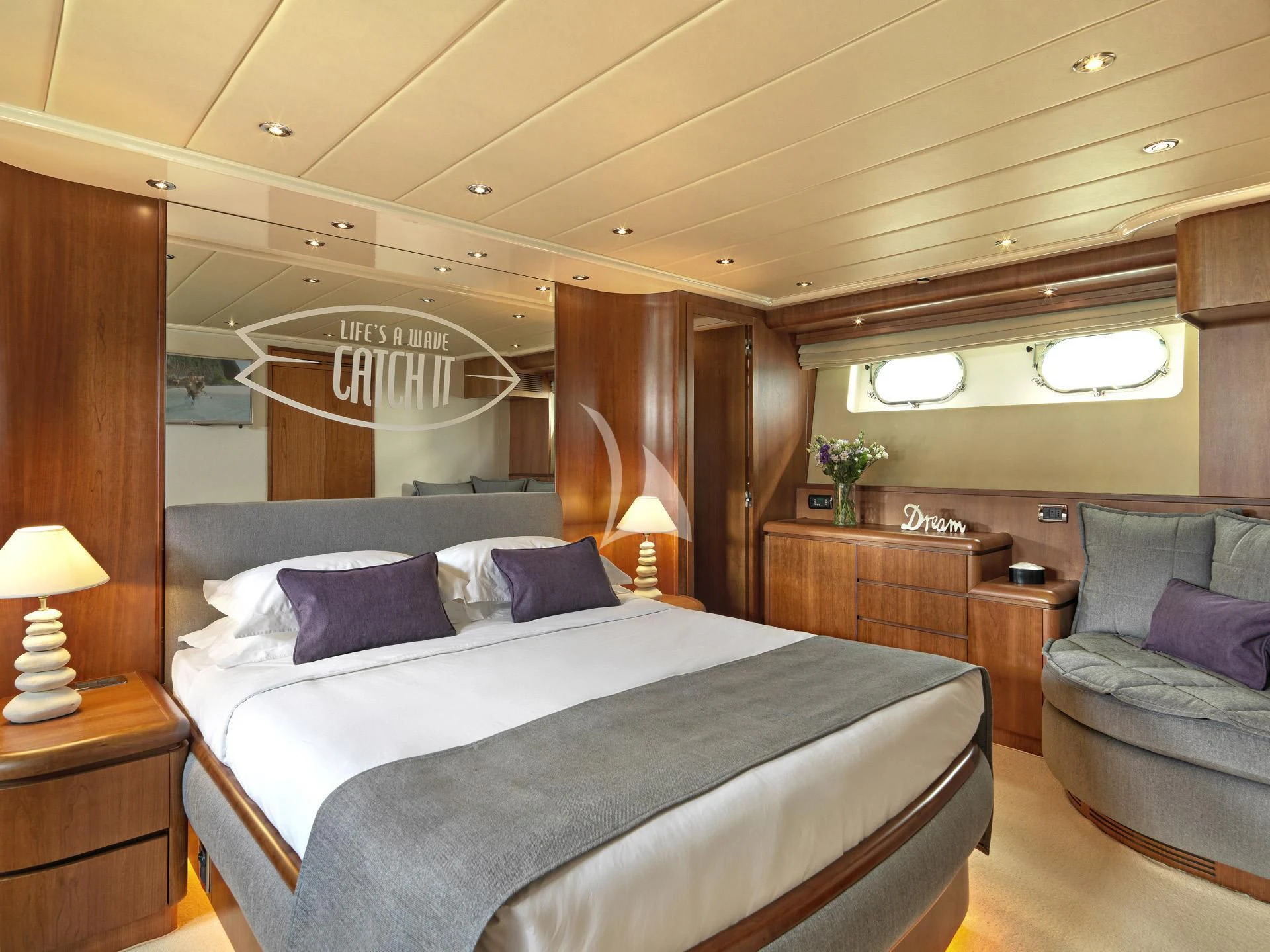 a bed in a hotel room aboard MANTRA Yacht for Sale