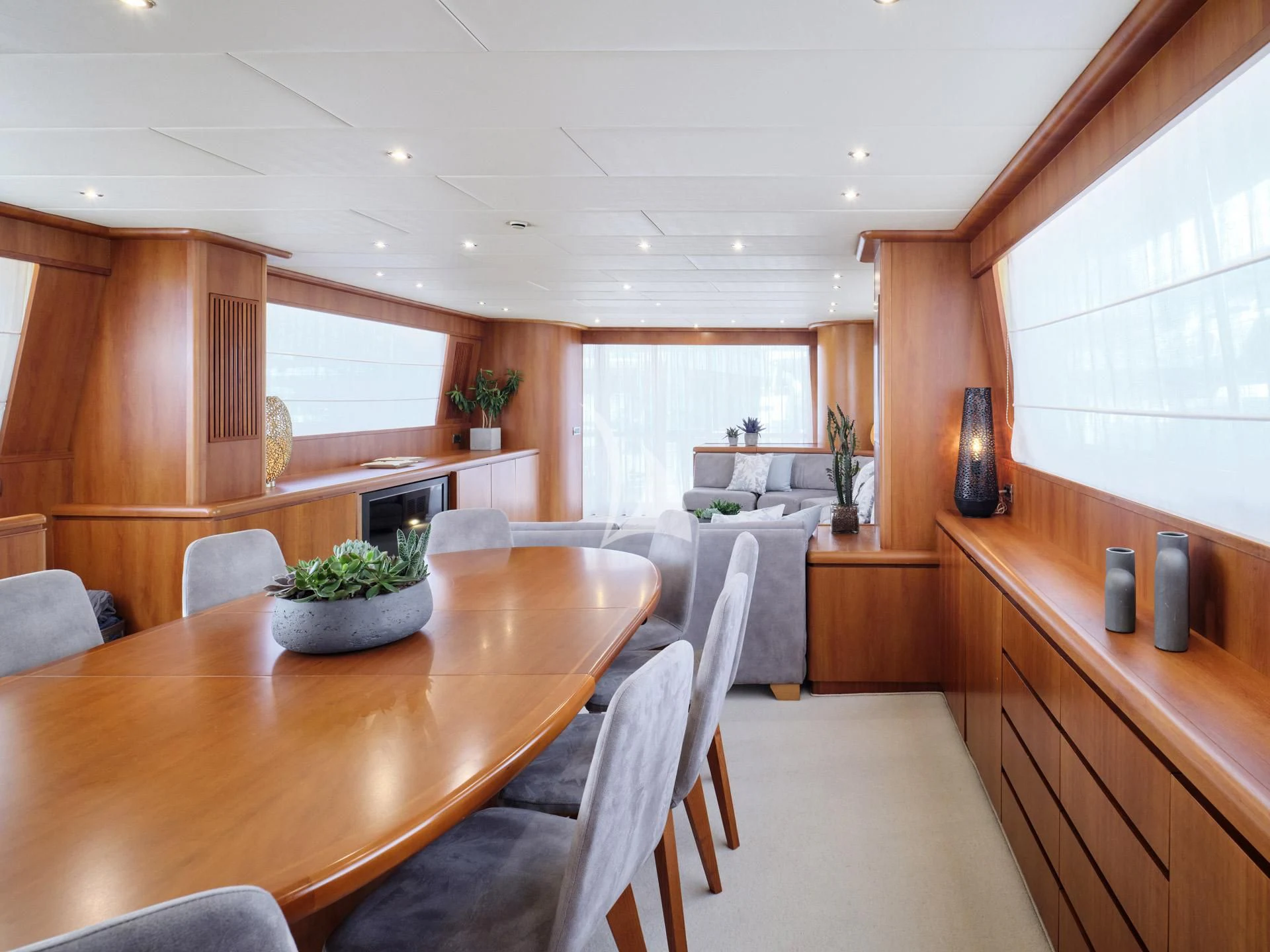 a dining room and kitchen aboard MANTRA Yacht for Sale