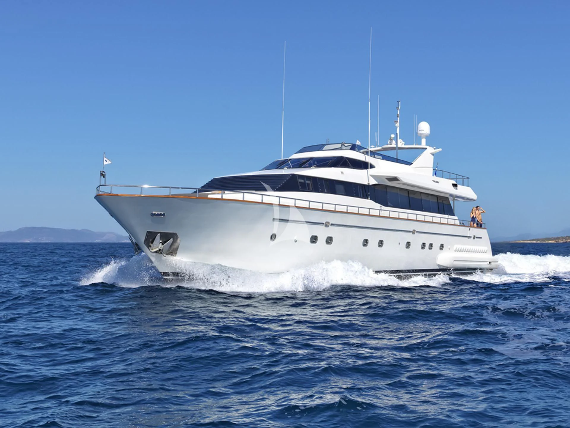 a white boat on the water aboard MANTRA Yacht for Sale