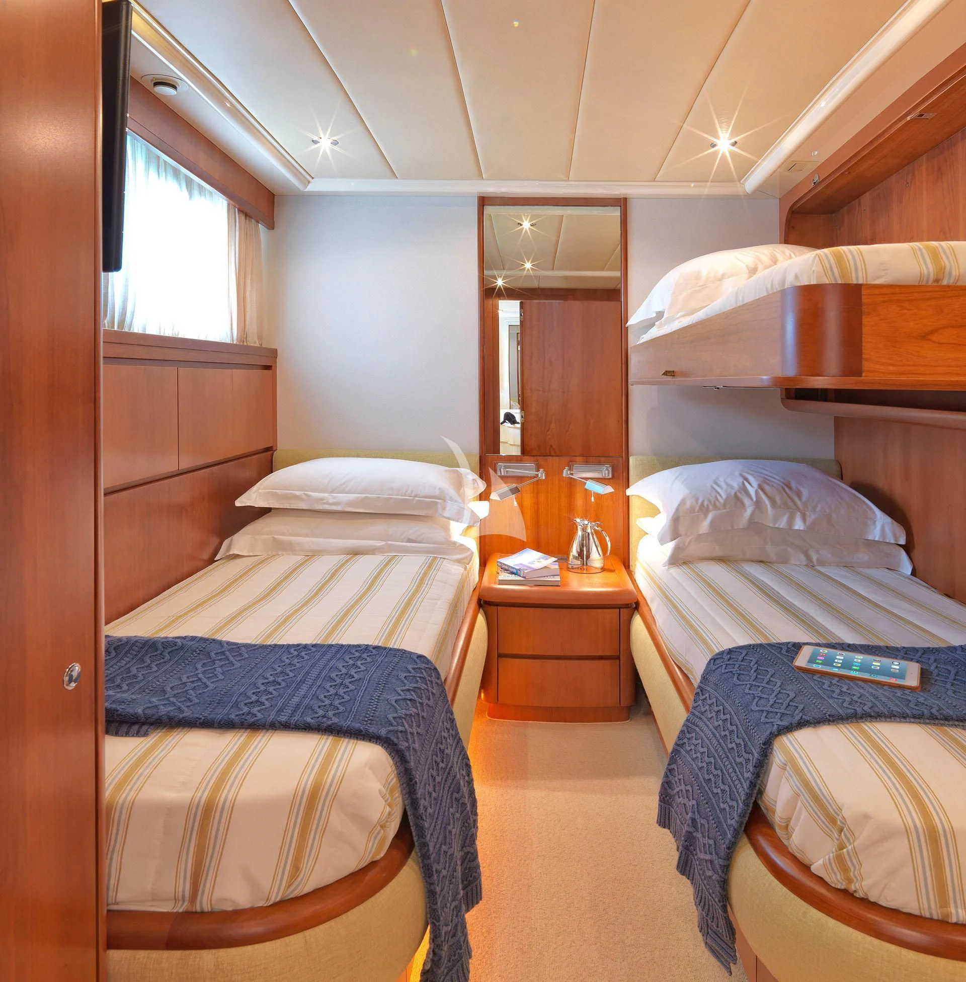 a room with bunk beds aboard MANTRA Yacht for Sale
