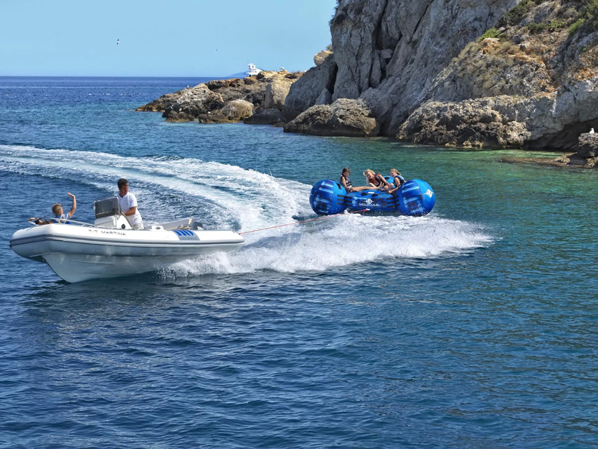 a group of people on a boat aboard MANTRA Yacht for Sale