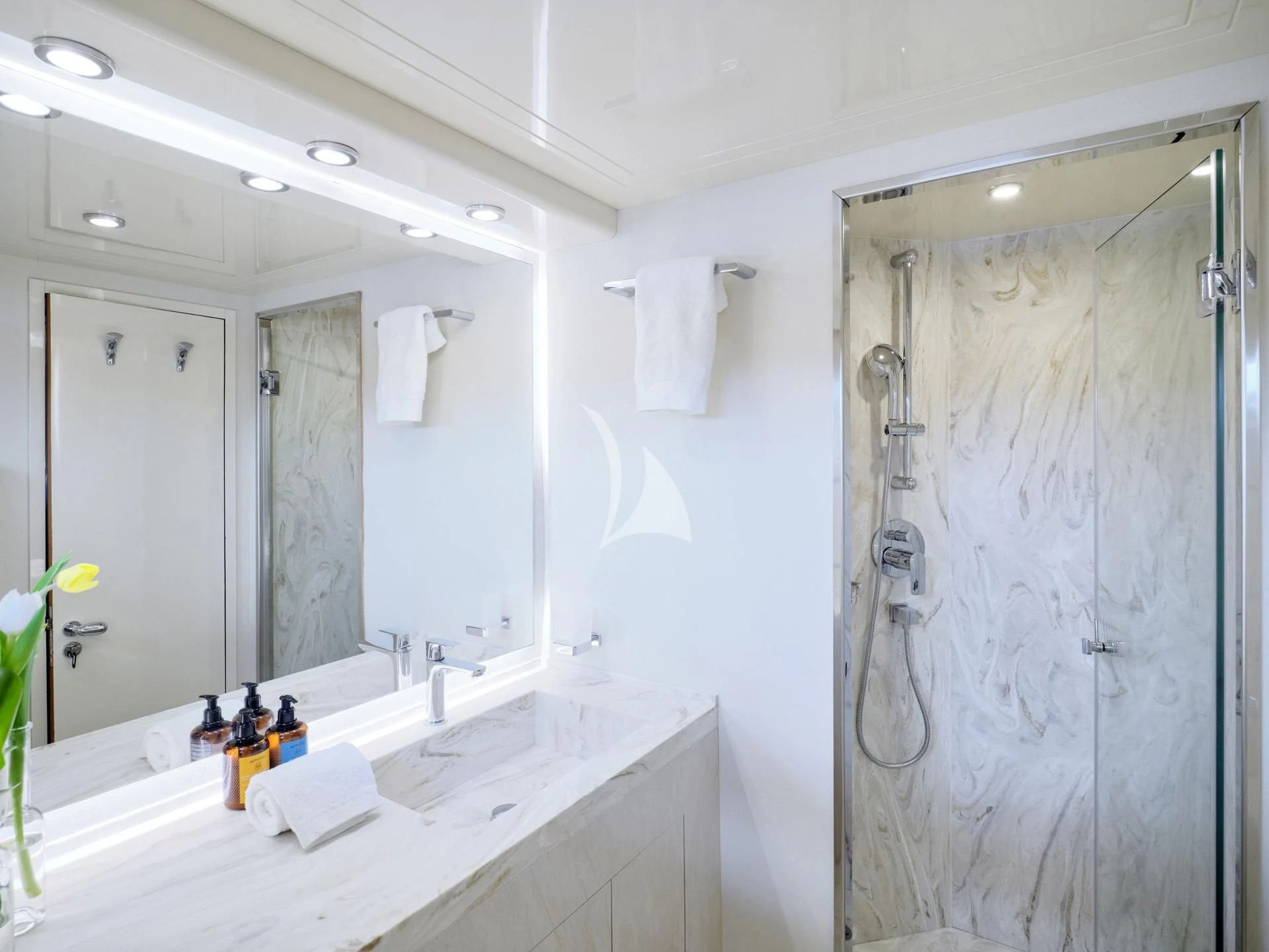 a bathroom with a shower and sink aboard MANTRA Yacht for Sale