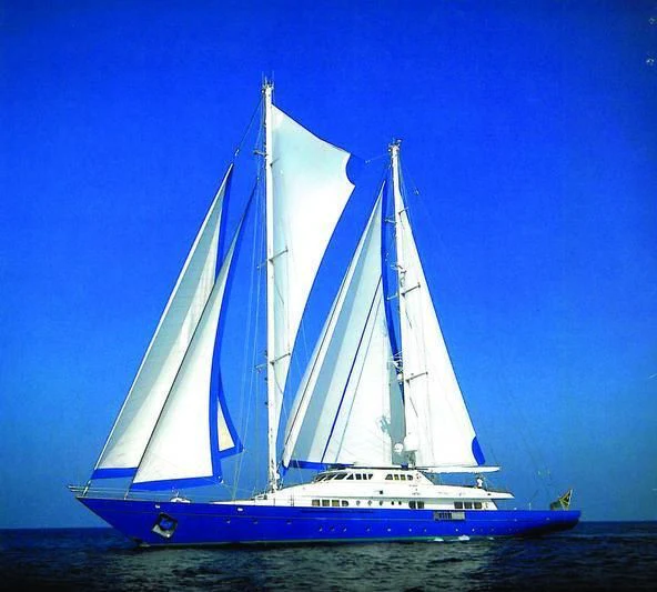 a sailboat in the water aboard BLUE GOLD Yacht for Sale
