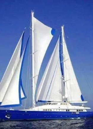 a large white sailboat aboard BLUE GOLD Yacht for Sale