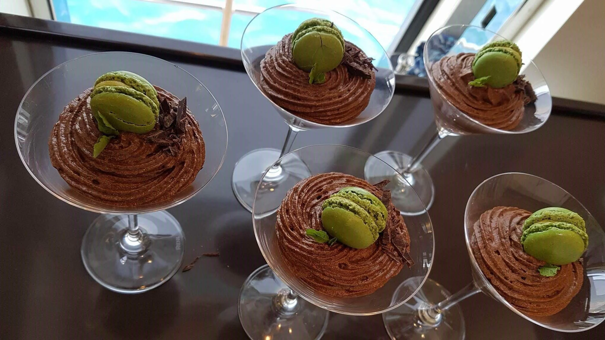 a group of desserts on a table aboard TEMPEST WS Yacht for Charter