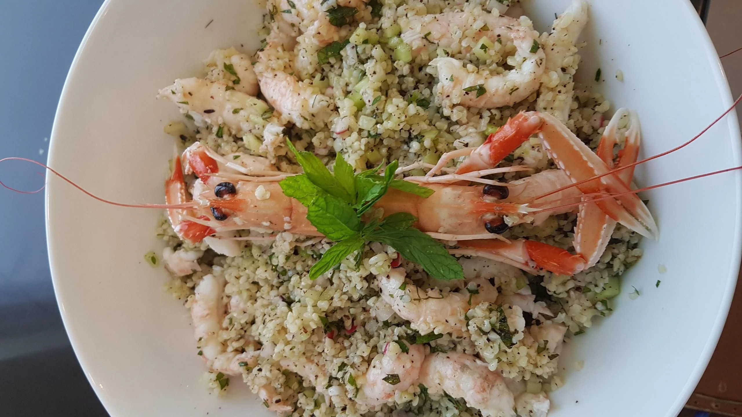a plate of food aboard TEMPEST WS Yacht for Charter