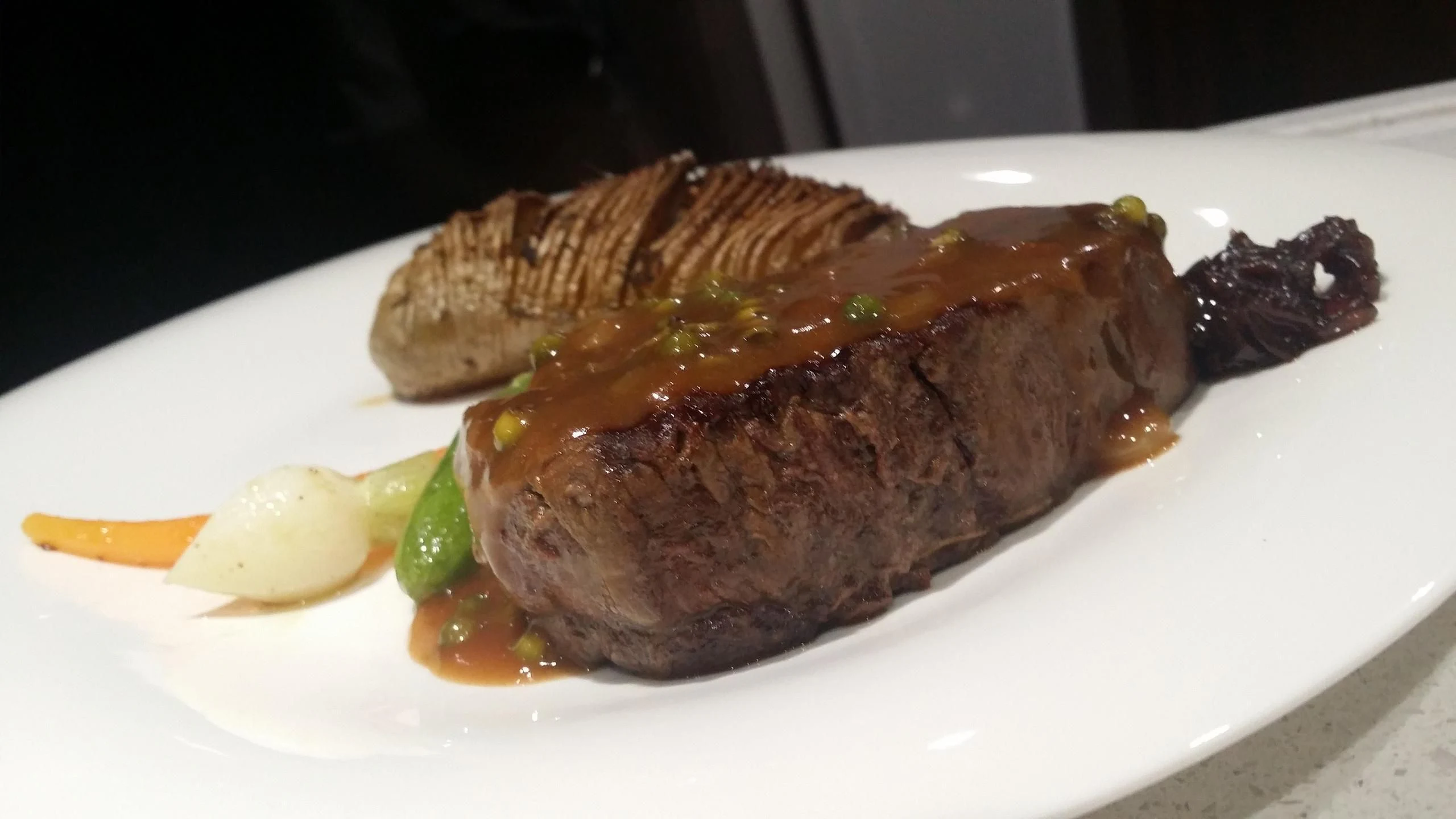 a plate of food aboard TEMPEST WS Yacht for Charter