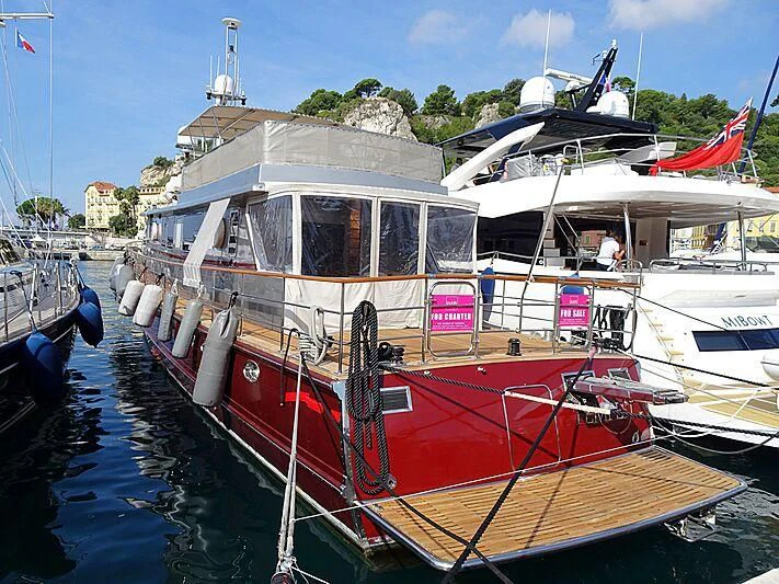 a boat docked at a pier aboard TEMPEST WS Yacht for Charter