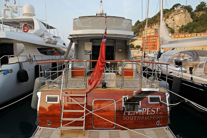 a boat docked at a pier aboard TEMPEST WS Yacht for Charter