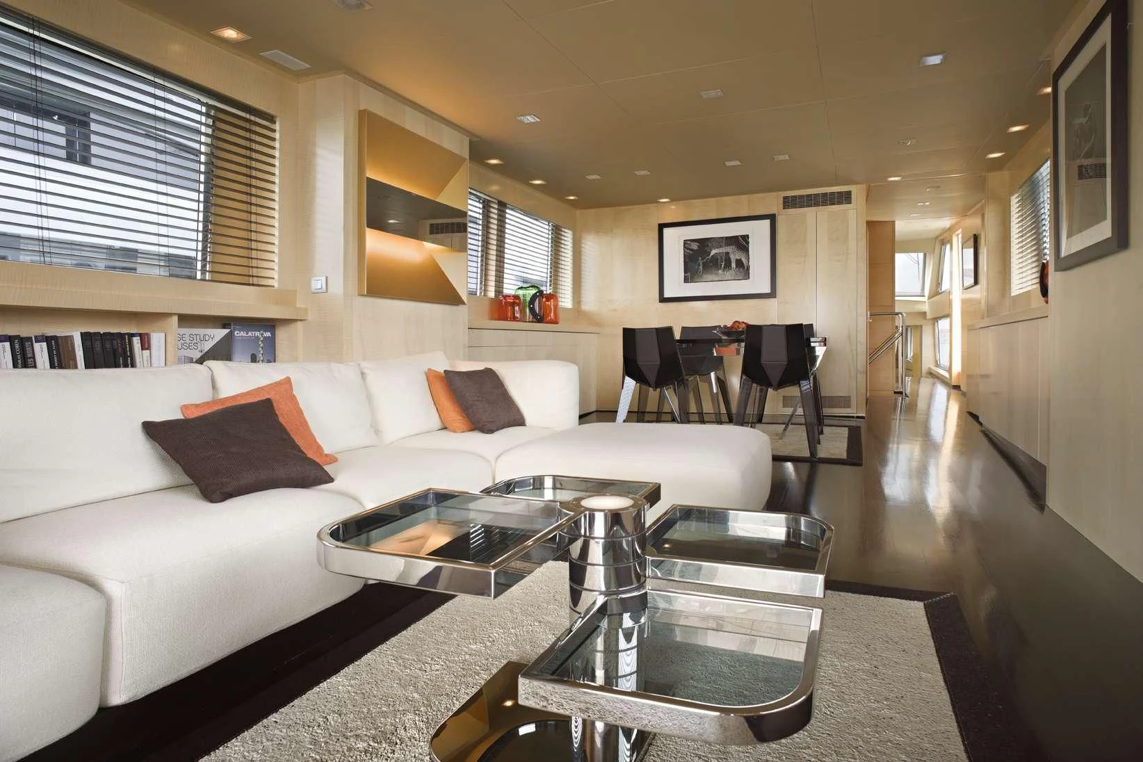 a living room with a couch and coffee table aboard TEMPEST WS Yacht for Charter