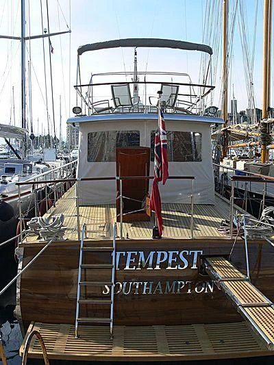 a boat in a harbor aboard TEMPEST WS Yacht for Charter