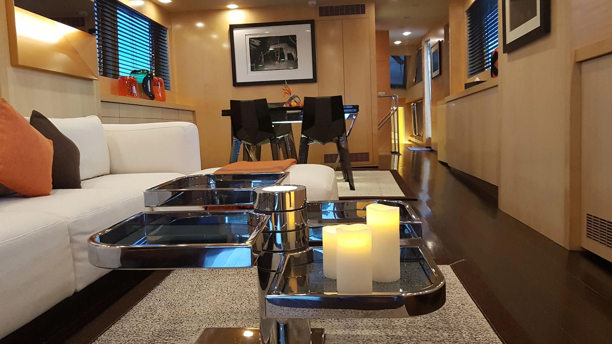 a living room with a table and chairs aboard TEMPEST WS Yacht for Charter