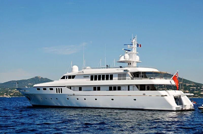 a large white boat in the water aboard TEMPO Yacht for Sale