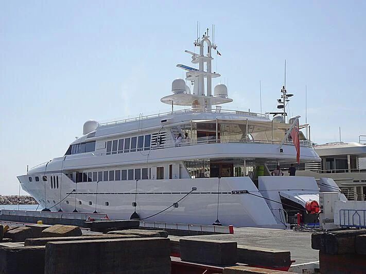 a large ship docked aboard TEMPO Yacht for Sale