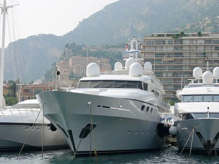 a couple of boats sit in the water aboard TEMPO Yacht for Sale