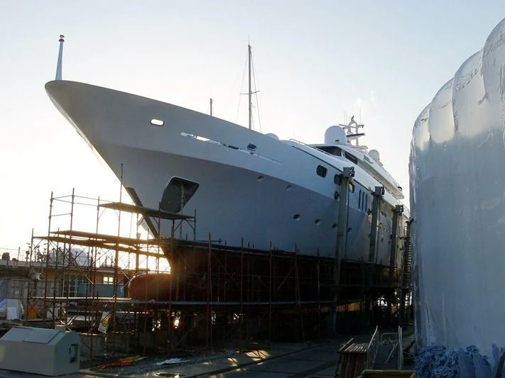 a large ship docked aboard TEMPO Yacht for Sale
