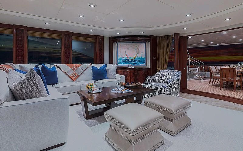 a living room with a large screen aboard AVALON Yacht for Sale
