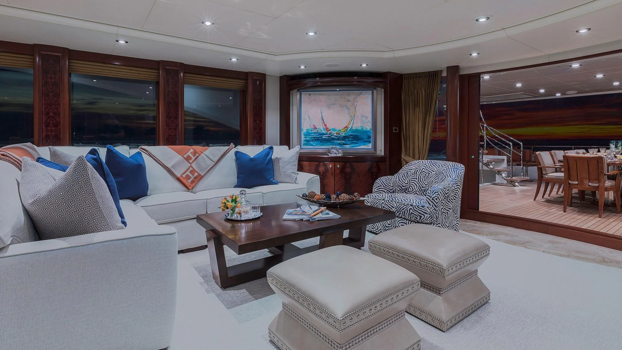 a living room with a large screen aboard AVALON Yacht for Sale