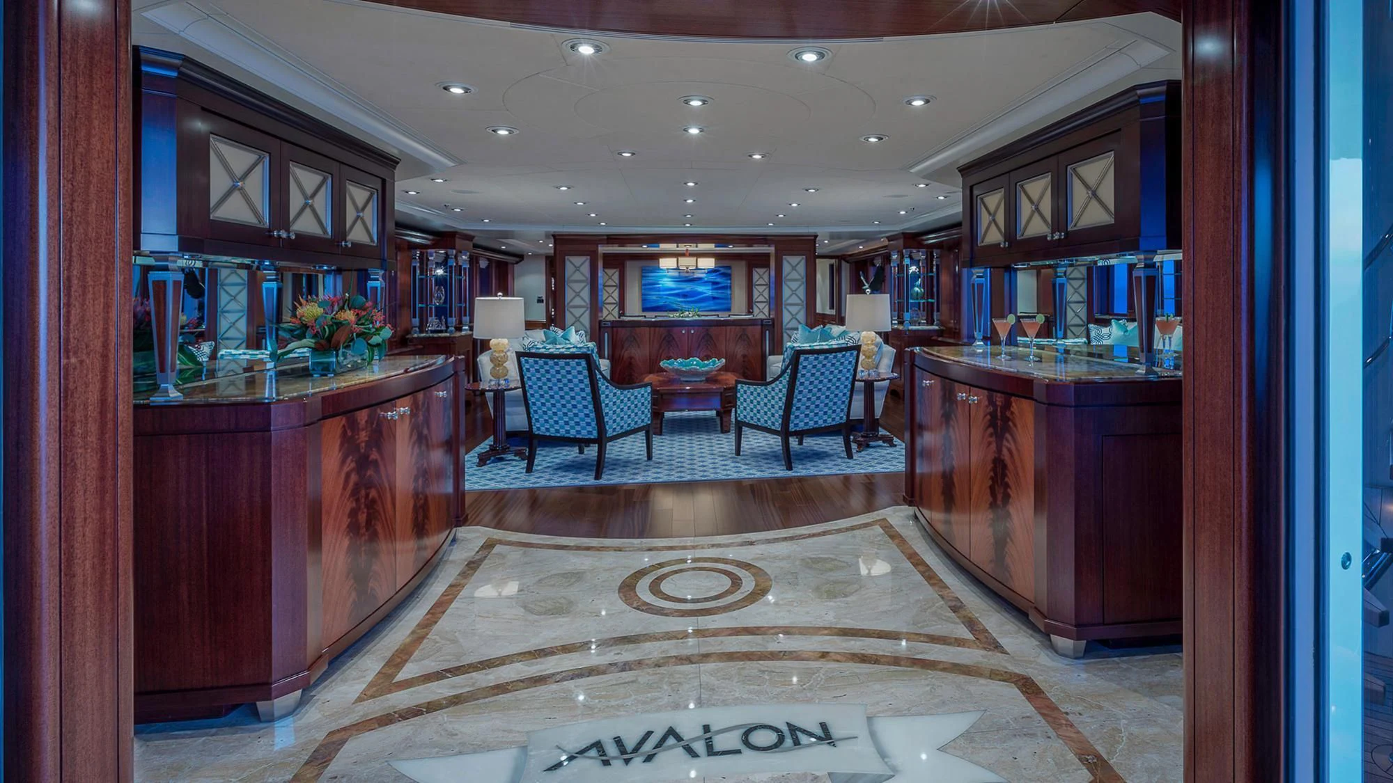a room with a couch and a table and chairs aboard AVALON Yacht for Sale