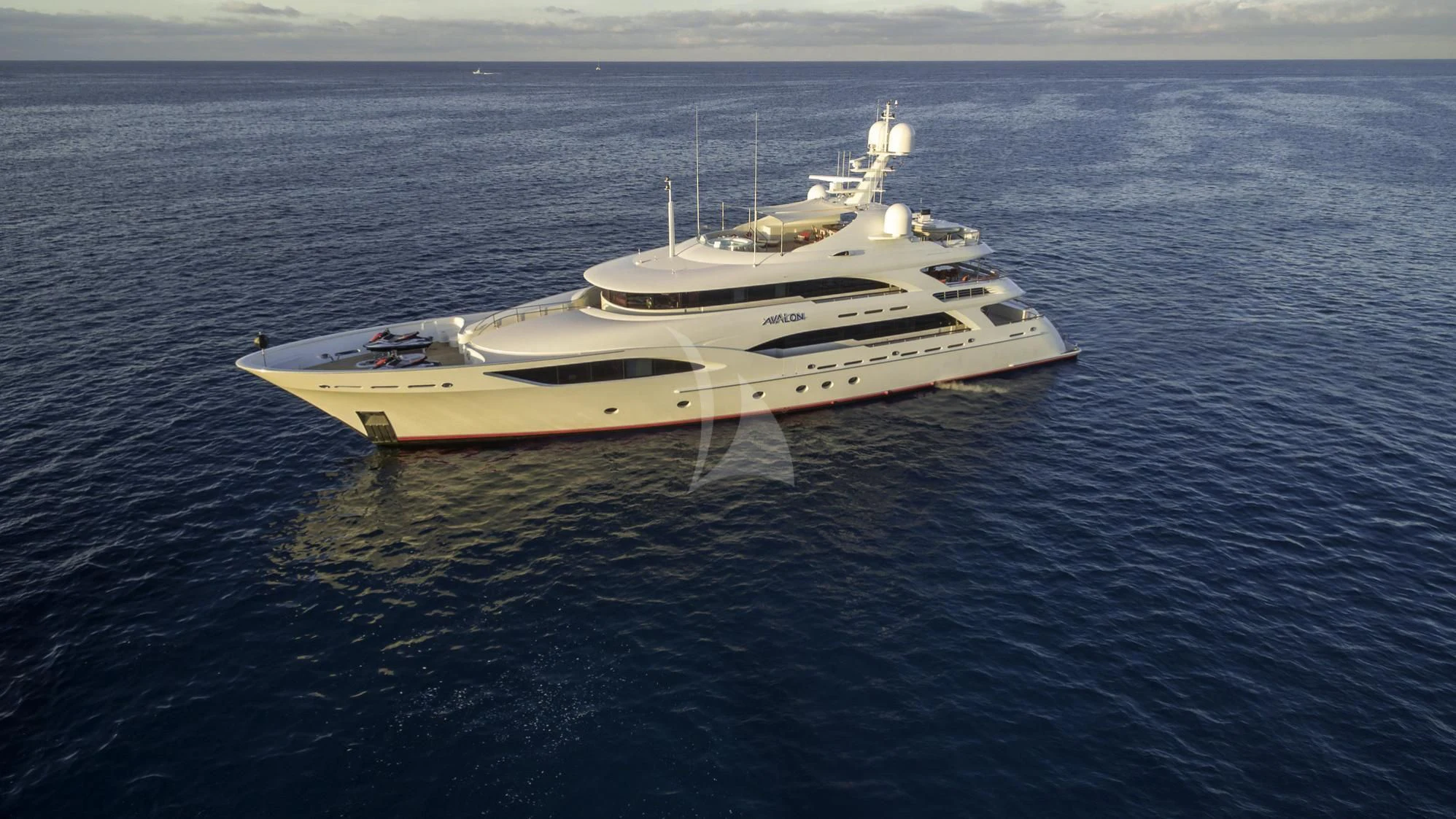 a white boat in the water aboard AVALON Yacht for Sale