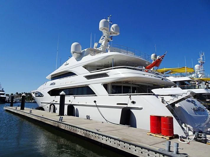 a white yacht docked aboard AVALON Yacht for Sale