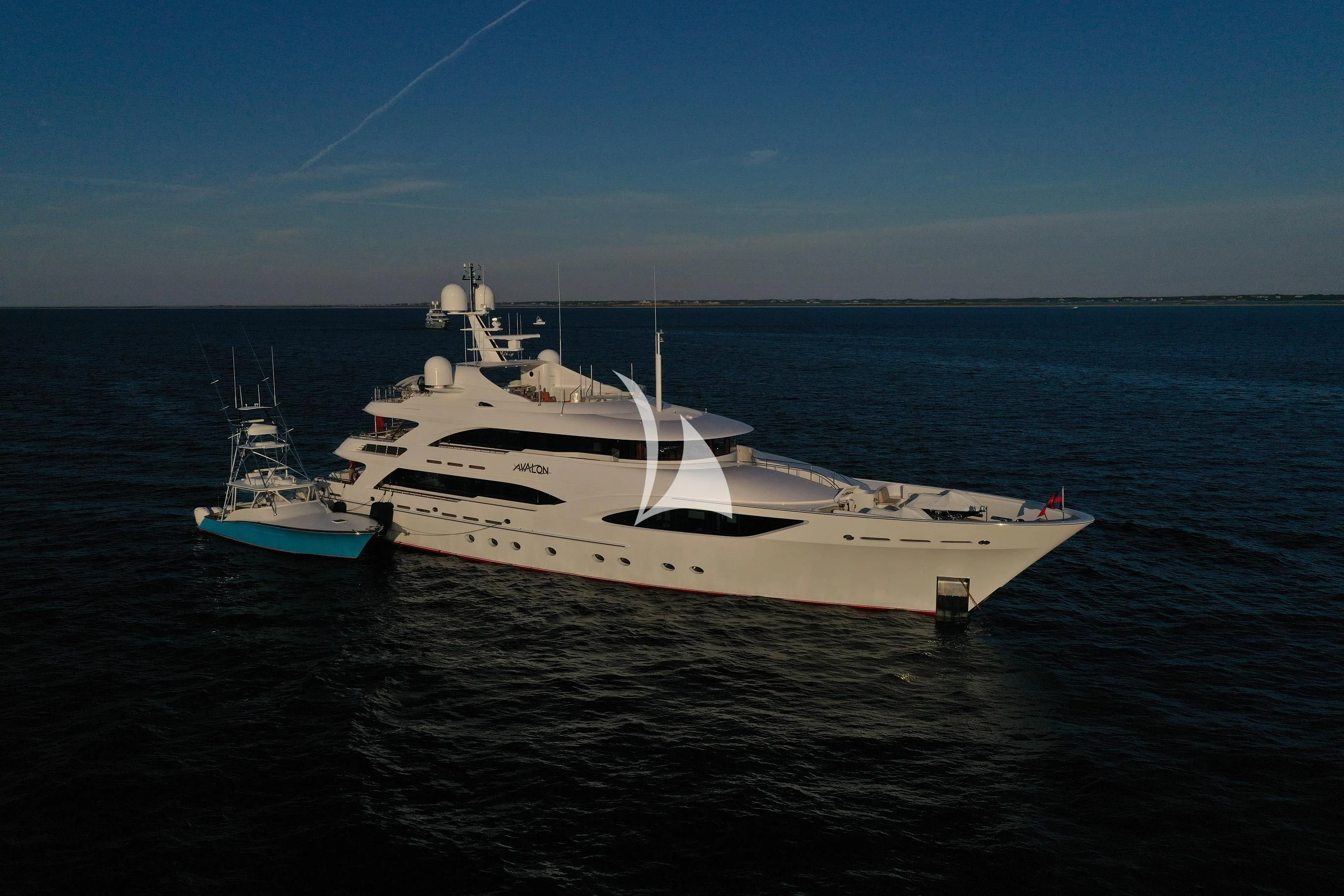 a couple of boats in the water aboard AVALON Yacht for Sale