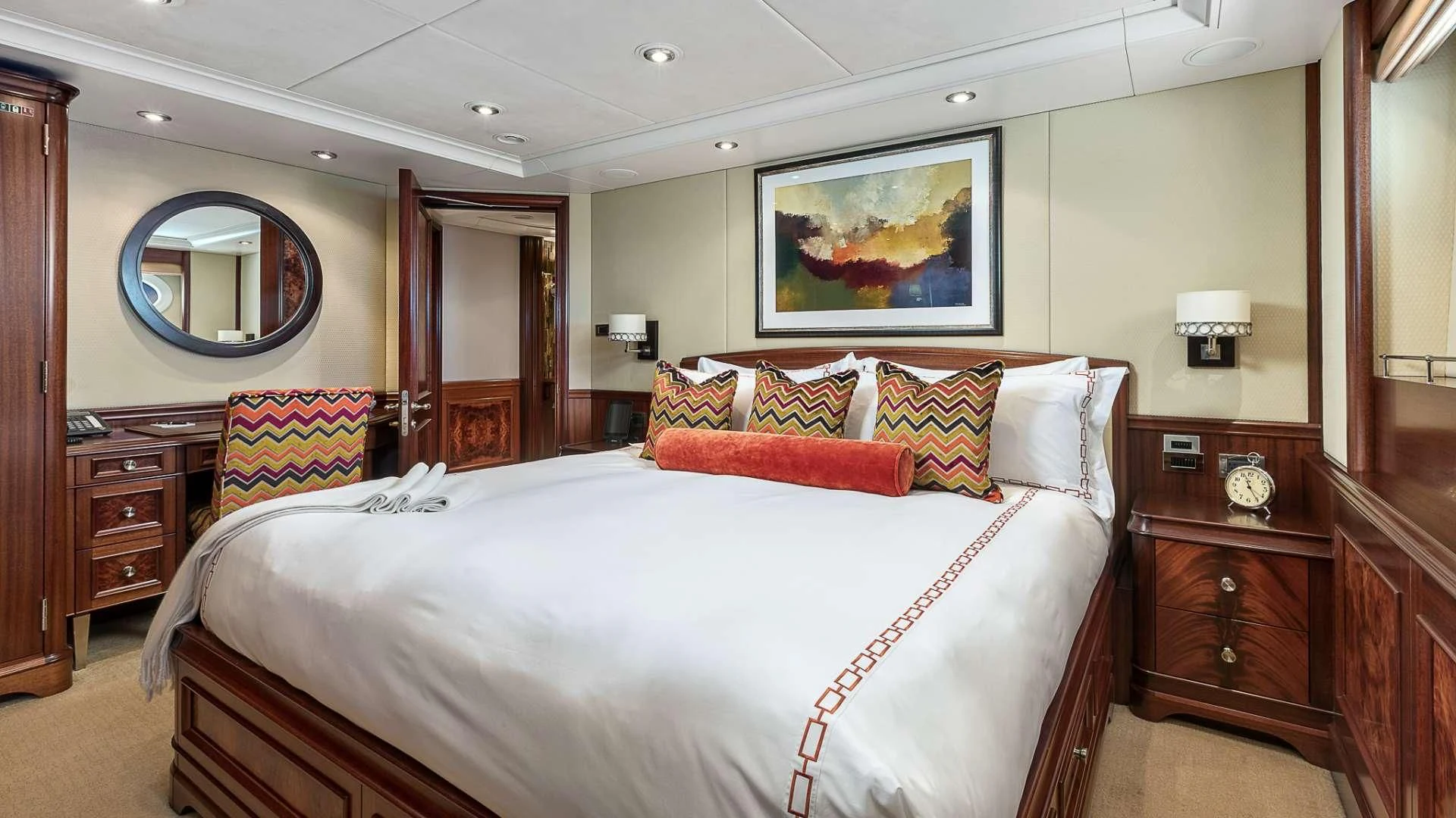a bedroom with a large bed aboard AVALON Yacht for Sale