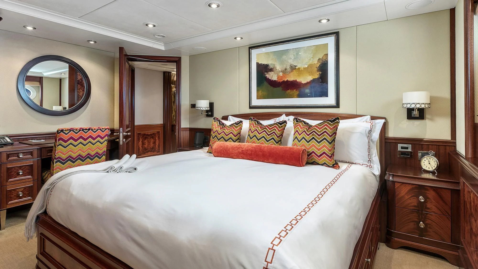 a bedroom with a large bed aboard AVALON Yacht for Sale