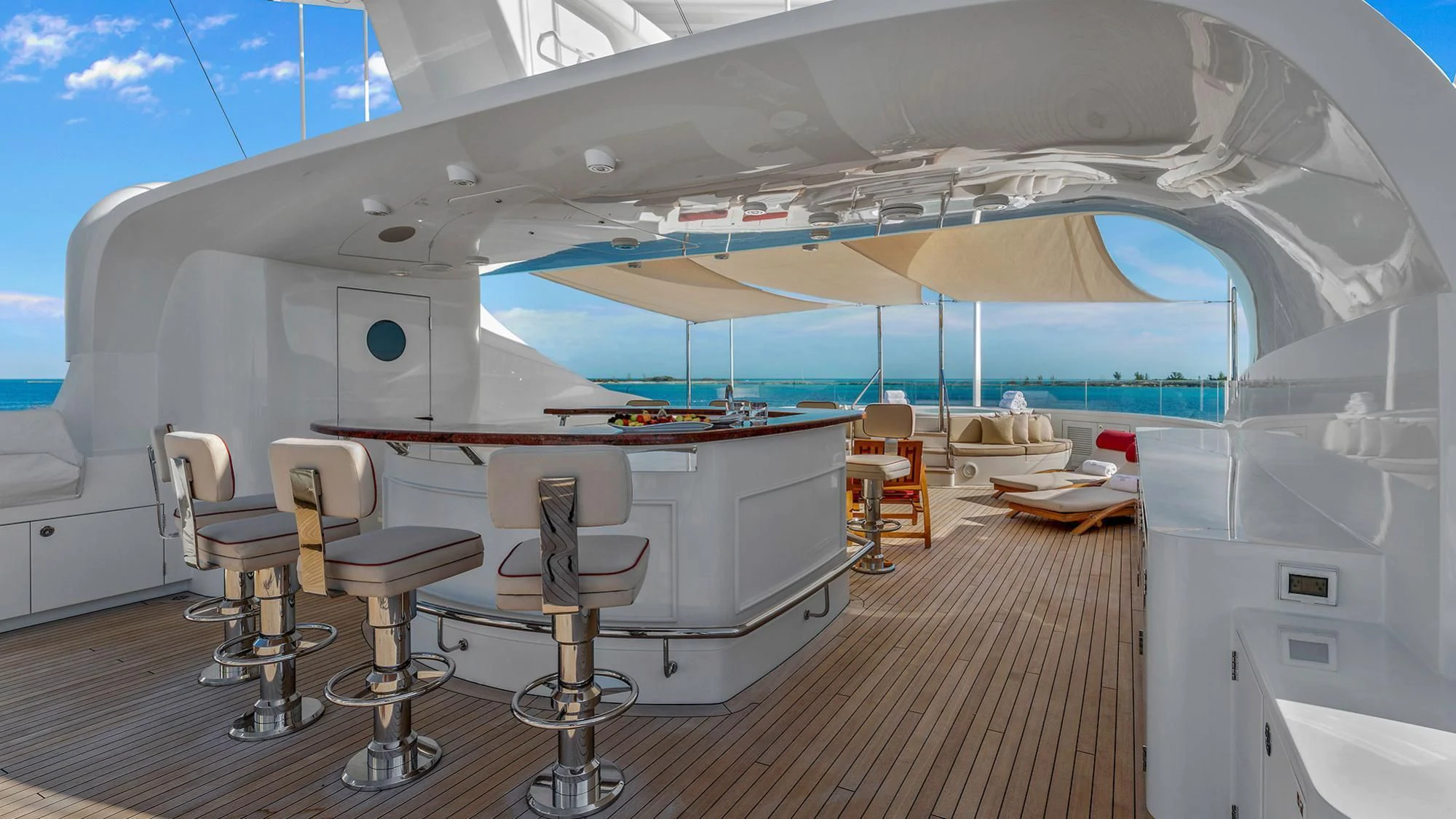 a large white tent with chairs and tables aboard AVALON Yacht for Sale