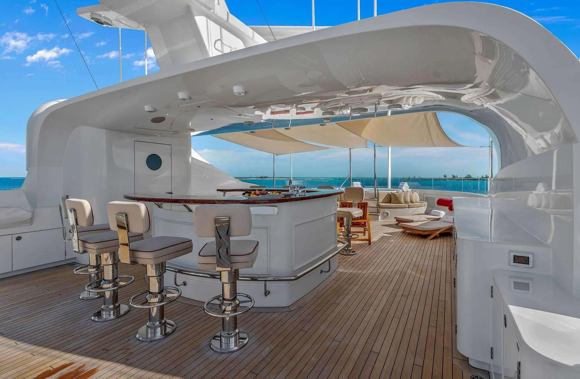 a large white tent with chairs and tables aboard AVALON Yacht for Sale