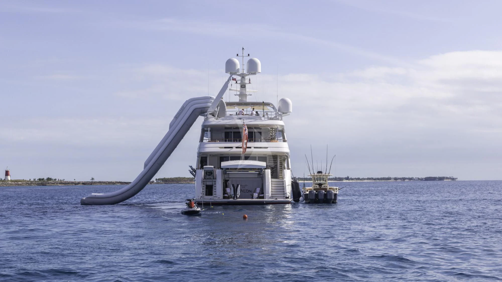 a large white boat in the water aboard AVALON Yacht for Sale