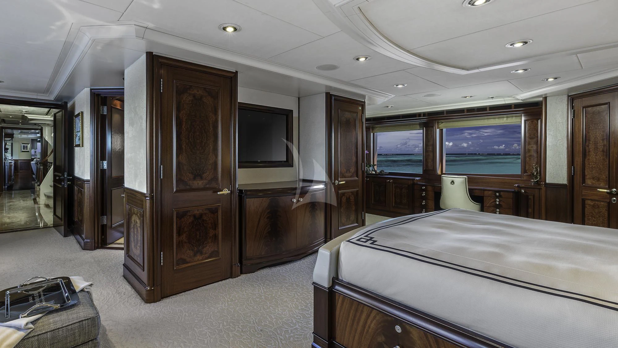 a room with a bed and a television aboard AVALON Yacht for Sale