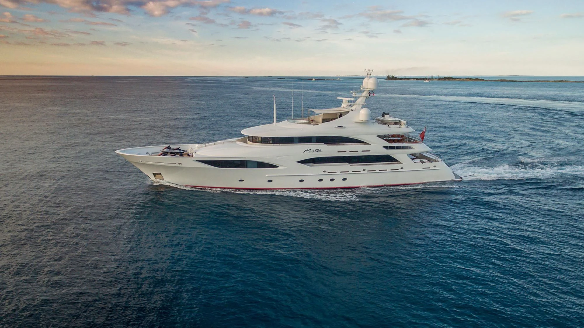 a white yacht in the water aboard AVALON Yacht for Sale