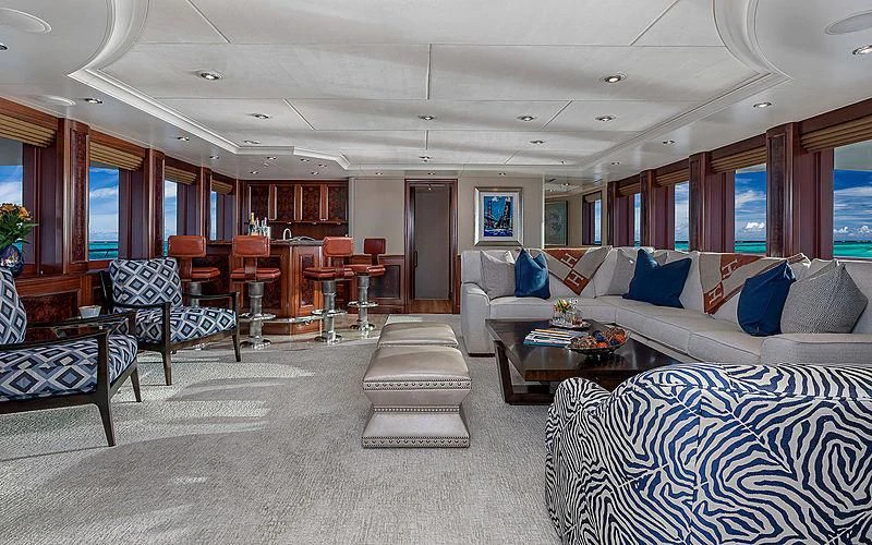 a living room with a couch and a table aboard AVALON Yacht for Sale