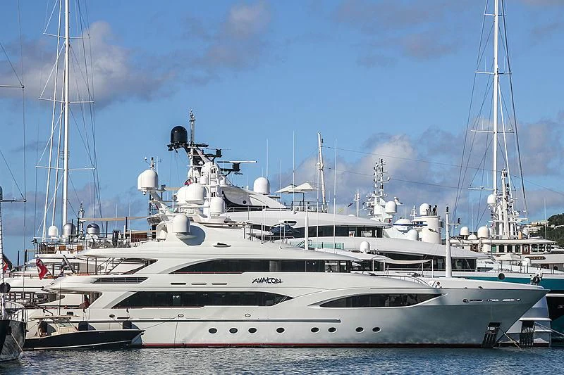 a white yacht with a blue sky aboard AVALON Yacht for Sale