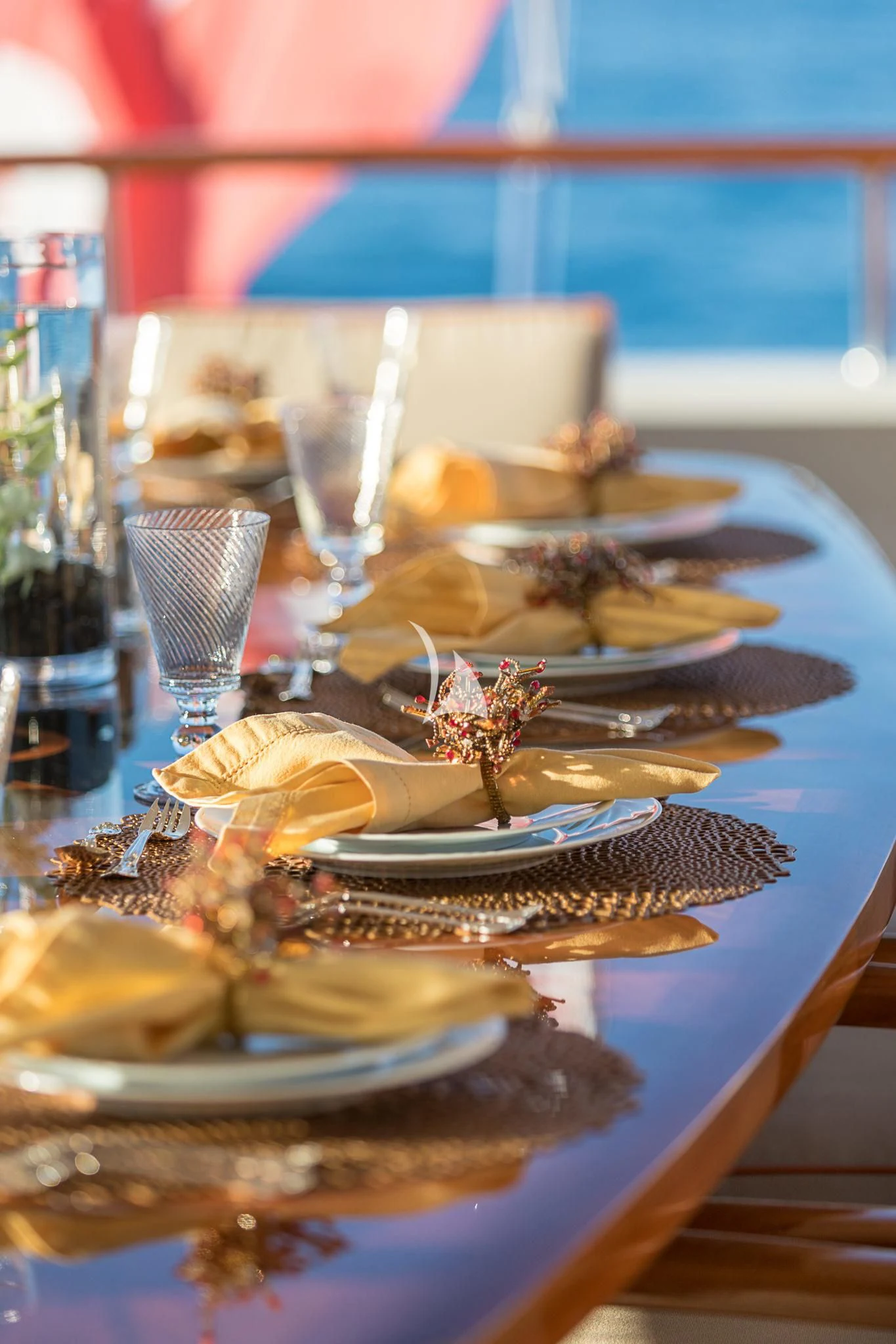 a table with plates of food aboard AVALON Yacht for Sale