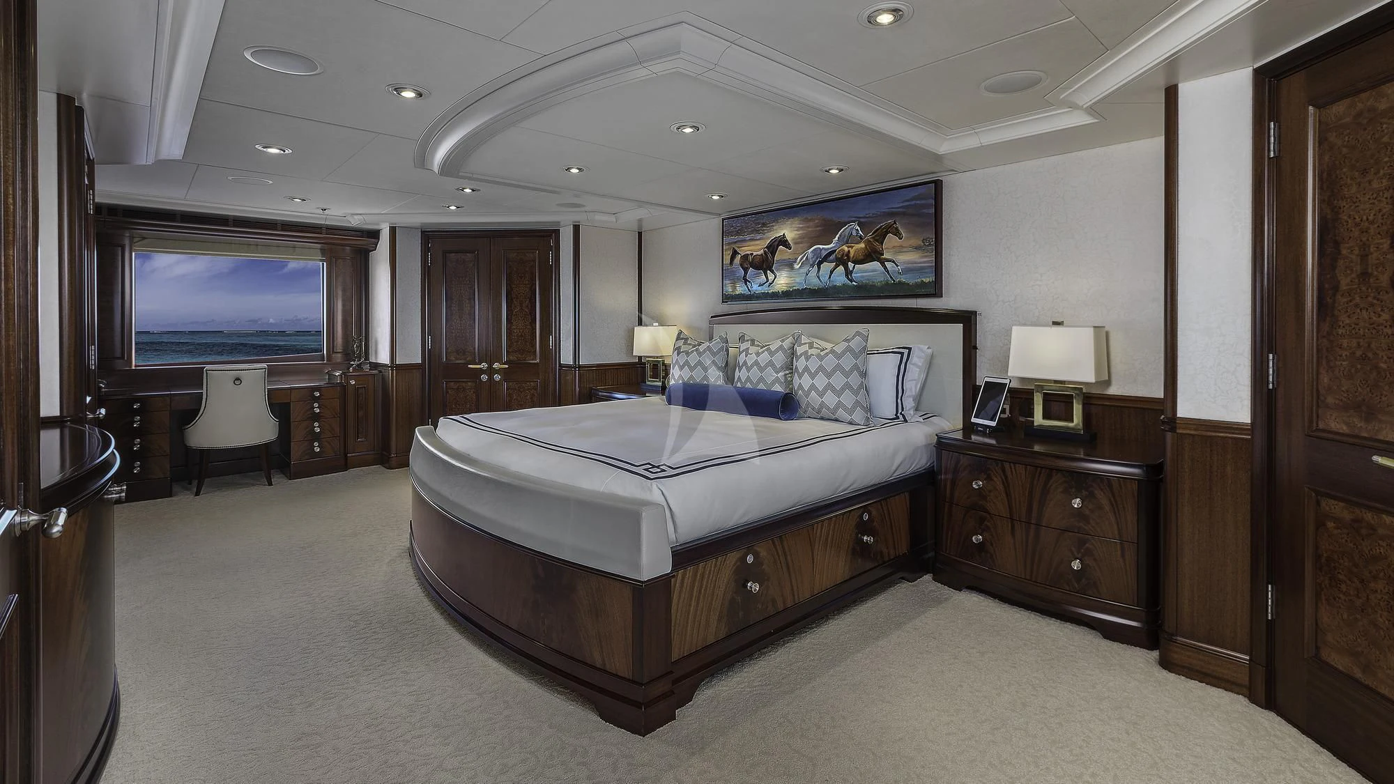 a large bedroom with a large bed aboard AVALON Yacht for Sale