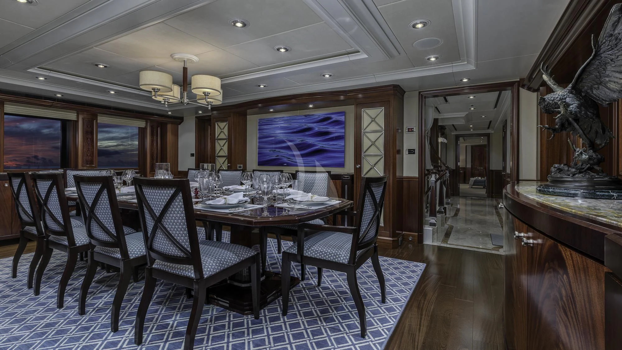 a dining room with a table and chairs aboard AVALON Yacht for Sale