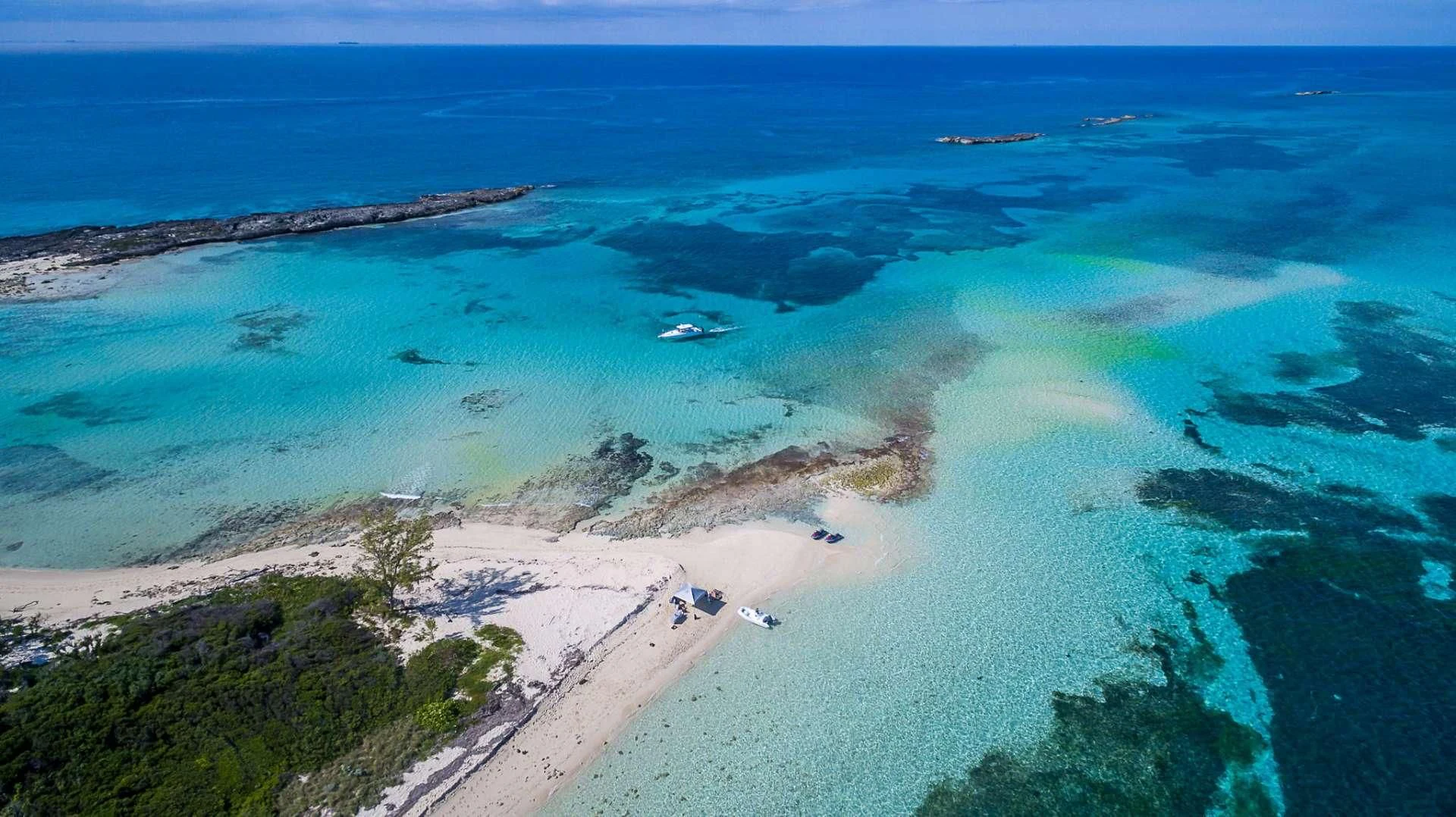 a beach with a body of water aboard AVALON Yacht for Sale