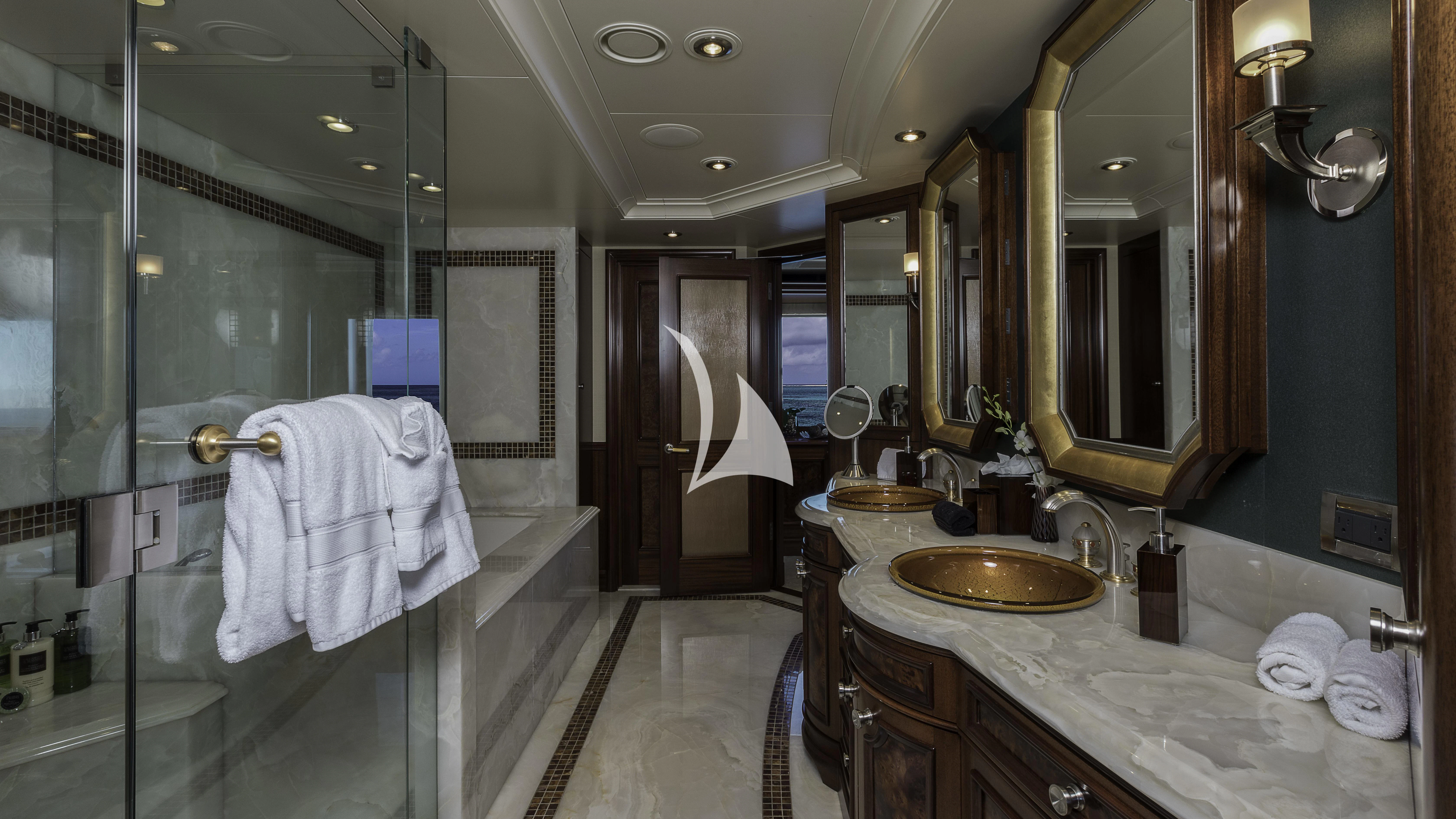 a bathroom with a large mirror aboard AVALON Yacht for Sale