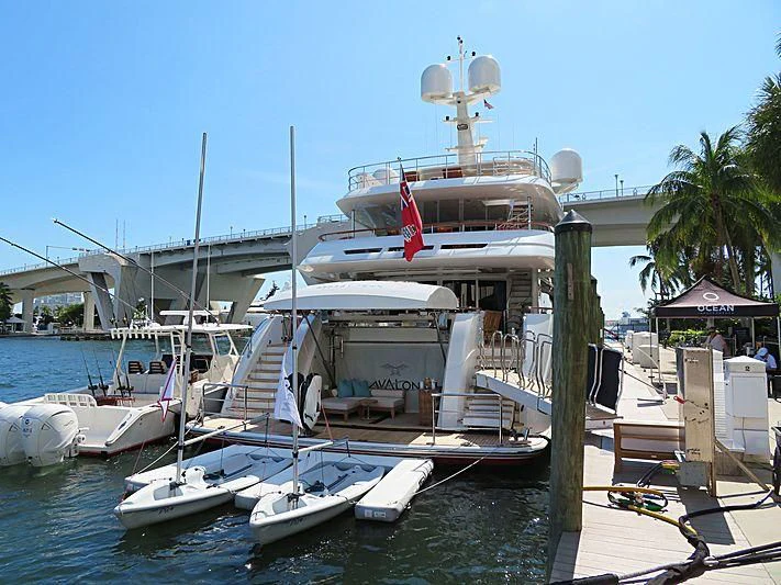 a boat docked at a pier aboard AVALON Yacht for Sale
