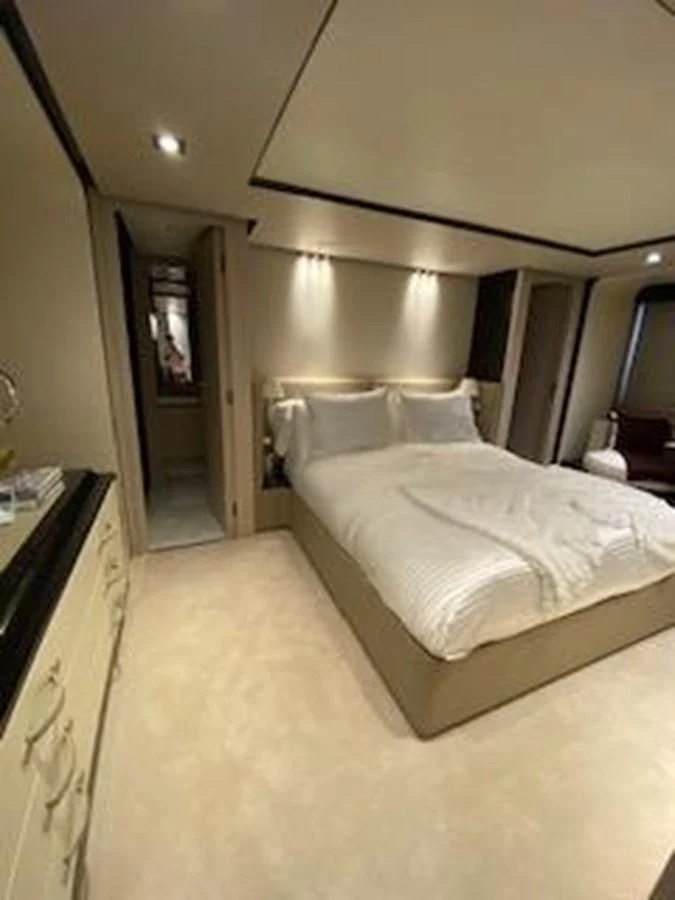 a bed in a room aboard FORTUNA Yacht for Sale