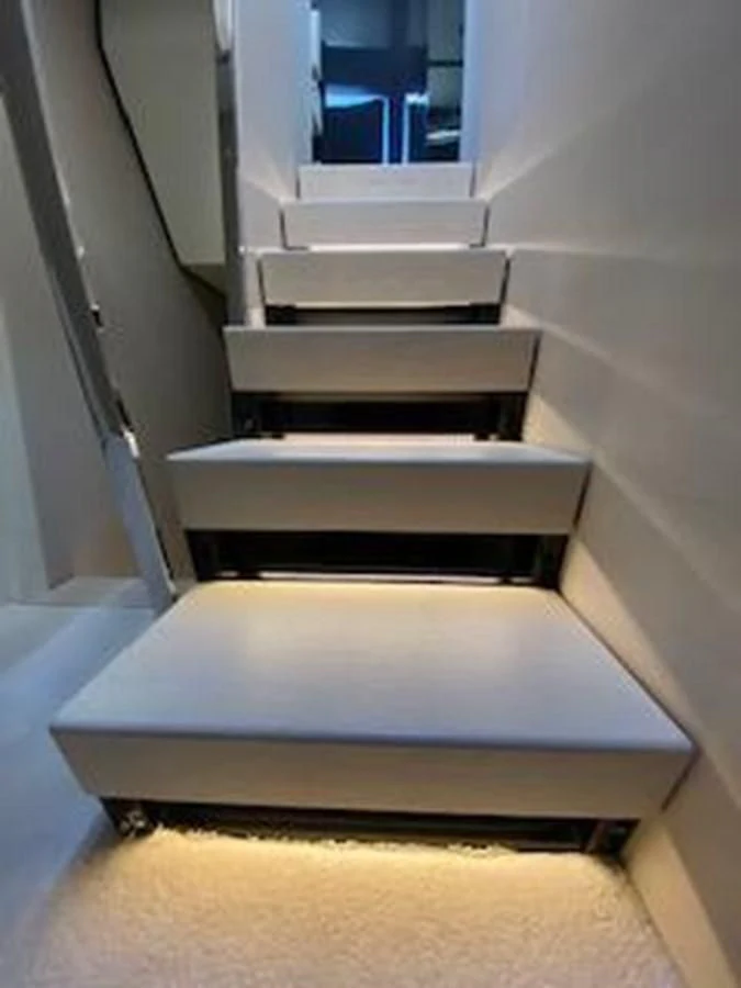 a set of white stairs aboard FORTUNA Yacht for Sale