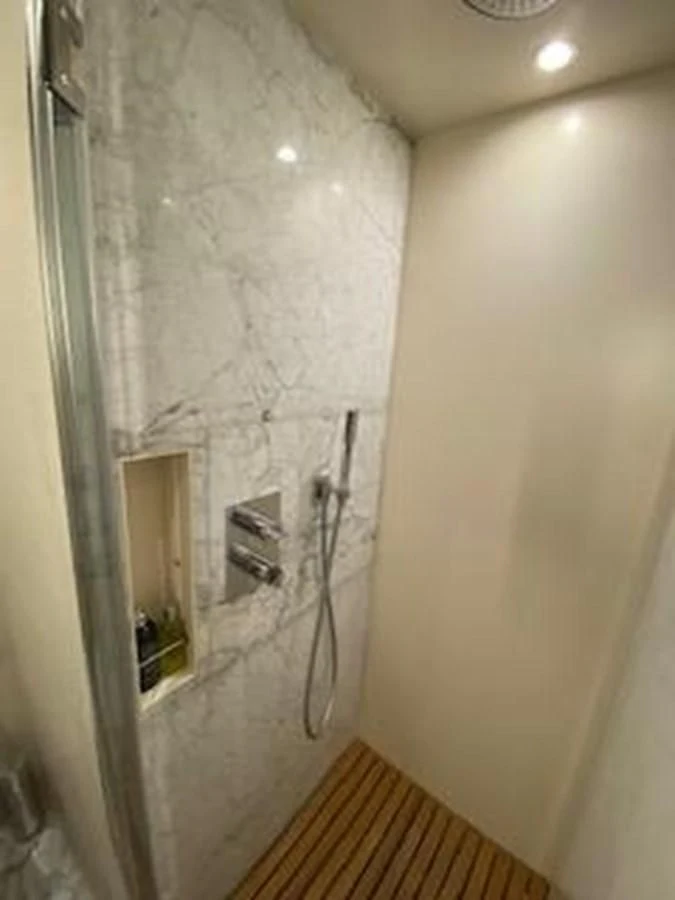 a bathroom with a shower aboard FORTUNA Yacht for Sale