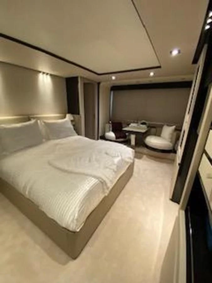 a bed in a hotel room aboard FORTUNA Yacht for Sale