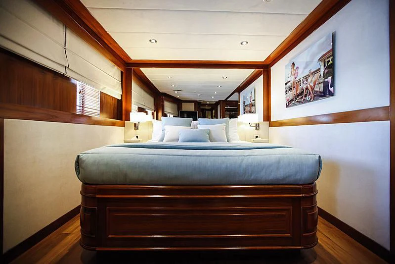 a bed in a room aboard MASQUENADA Yacht for Sale